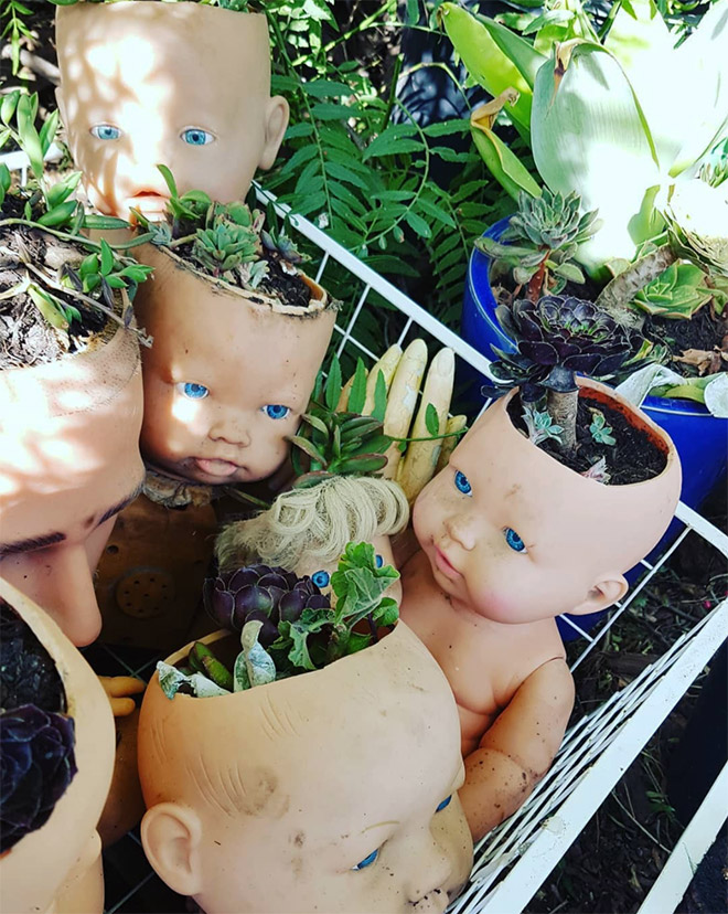Doll head planters is the creepiest thing ever.