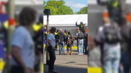 WATCH: Police detain dozens protesting against coronavirus lockdown in The Hague