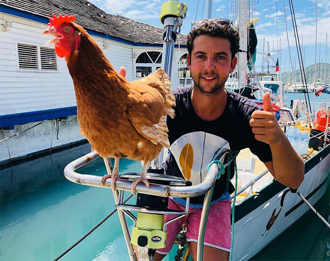 This guy sails around the world with his pet chicken.