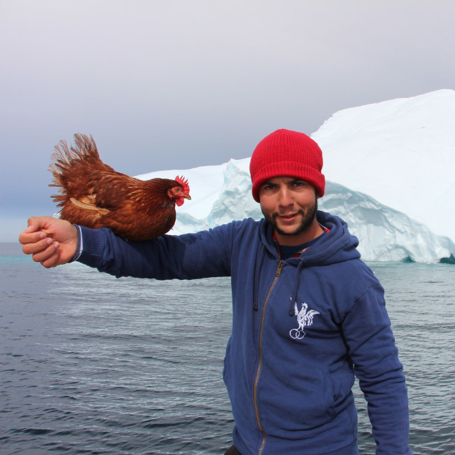 This guy sails around the world with his pet chicken.