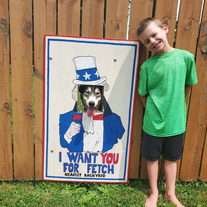 Funny fence dog window art.