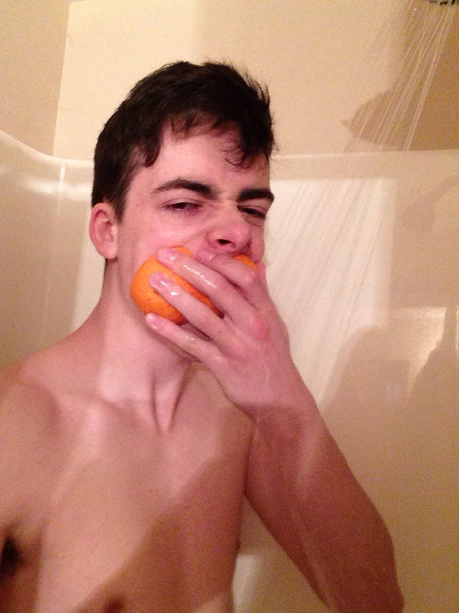 Showering with oranges.