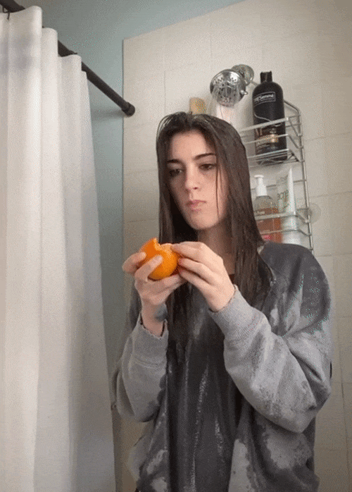 Showering with oranges.