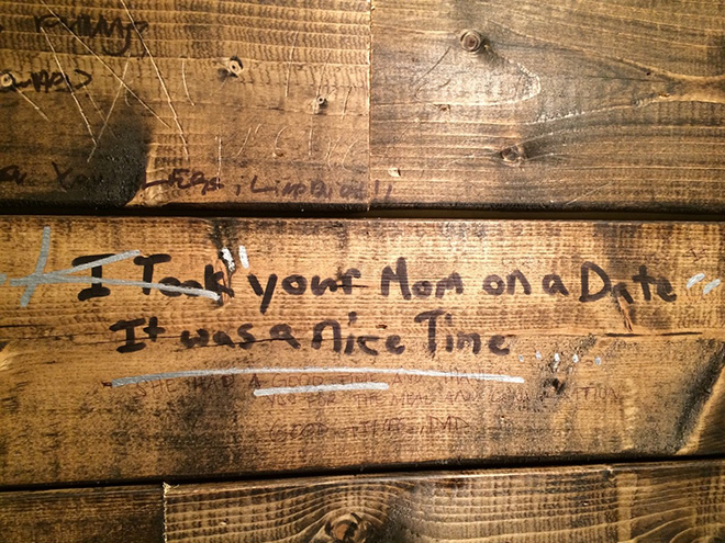 Funny toilet graffiti.