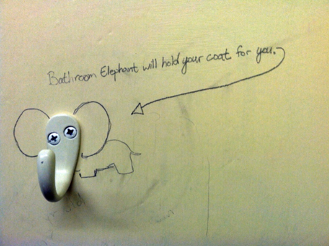 Funny toilet graffiti.