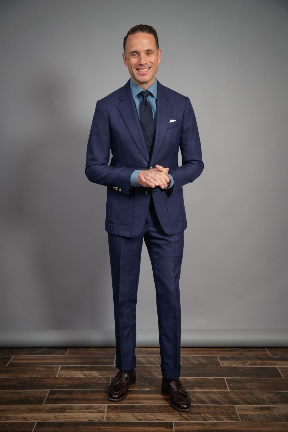 mens-capsule-wardrobe-navy-hopsack-suit-denim-shirt-tassel-loafers-grenadine-tie