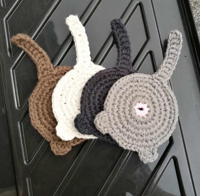 Crocheted cst butt coasters.