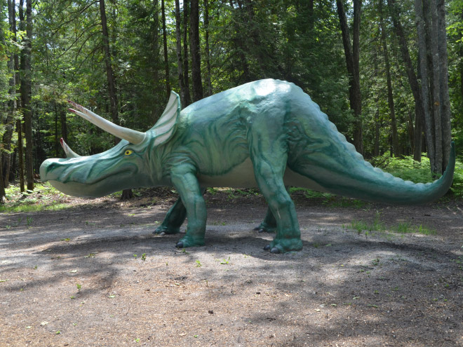 Hilariously bad dinosaur statue.