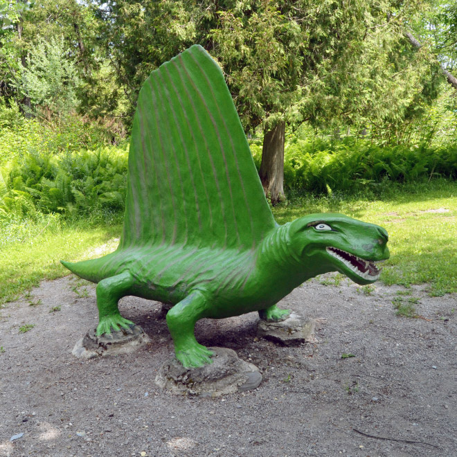 Hilariously bad dinosaur statue.