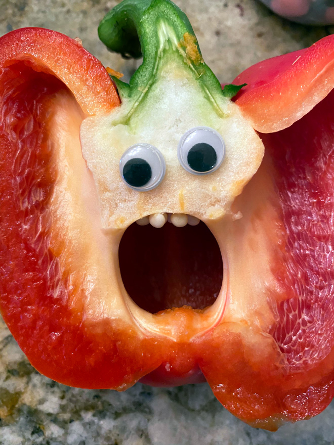 Bell pepper with googly eyes.