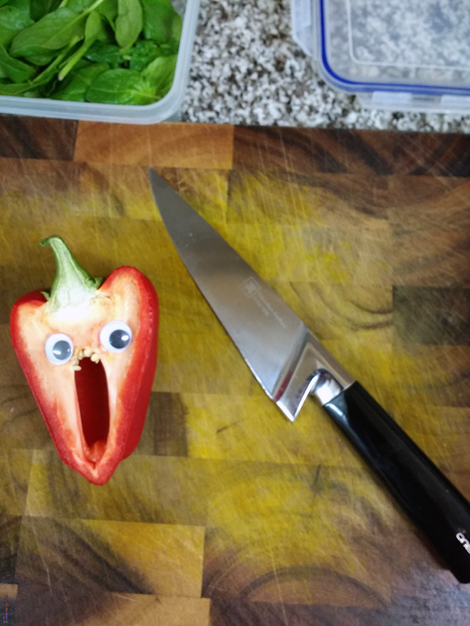 Bell pepper with googly eyes.