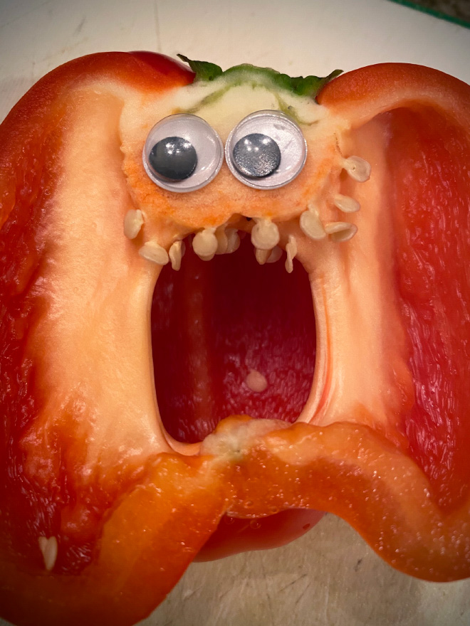 Bell pepper with googly eyes.