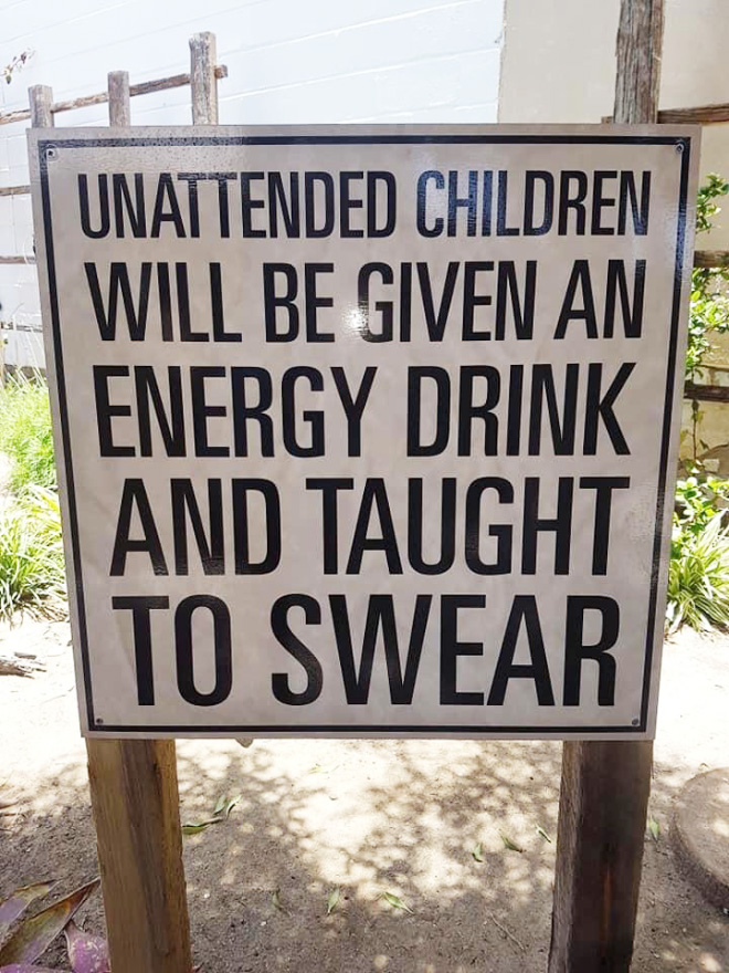 Hilariously threatening warning sign.