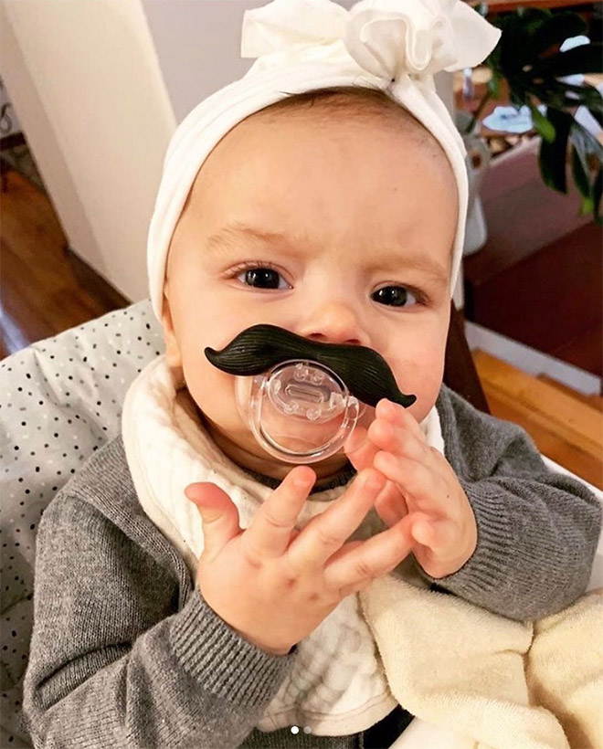 Mustache pacifier.