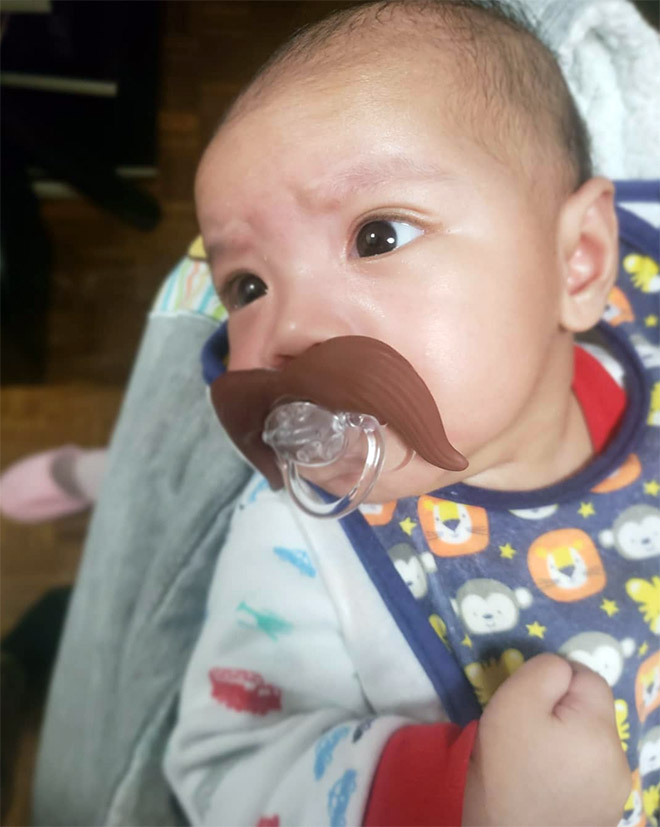 Mustache pacifier.