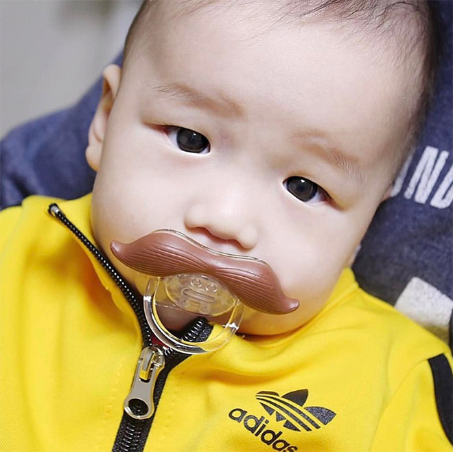 Mustache pacifier.