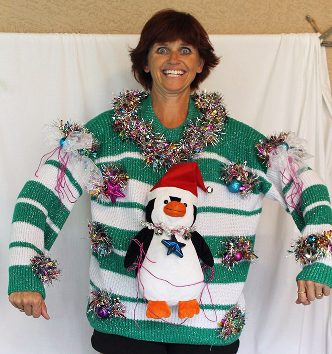 Ugly Christmas sweater with a crazy smile.
