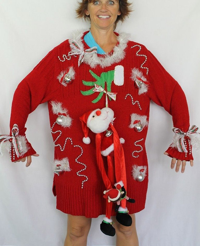 Ugly Christmas sweater with a crazy smile.