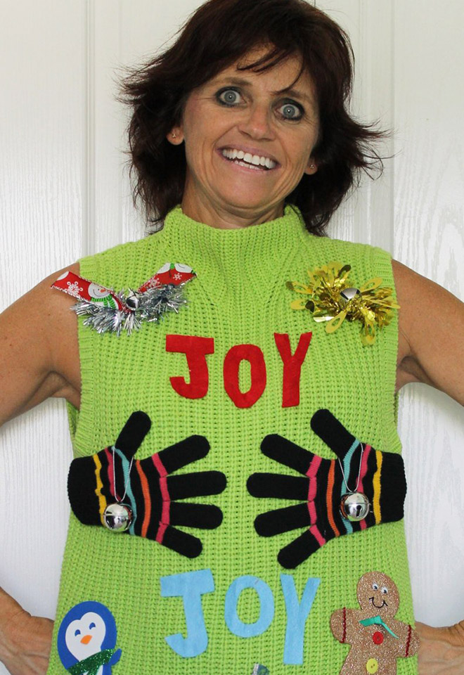 Ugly Christmas sweater with a crazy smile.