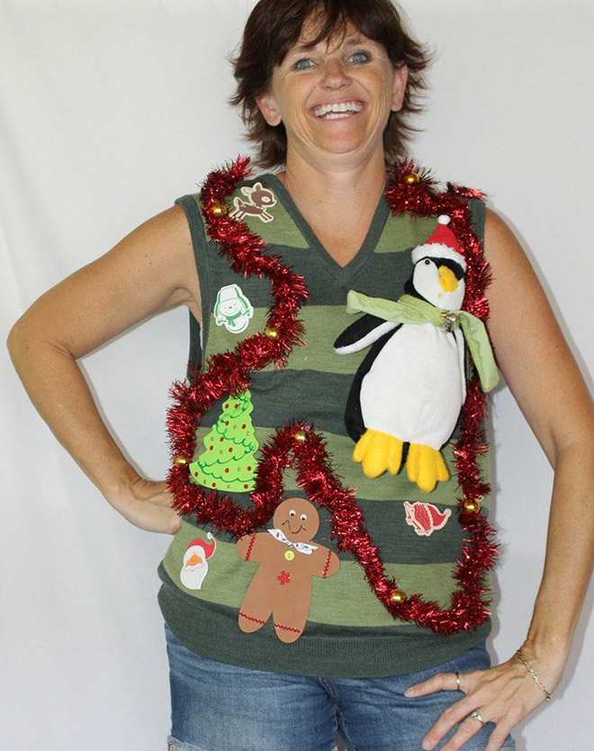 Ugly Christmas sweater with a crazy smile.