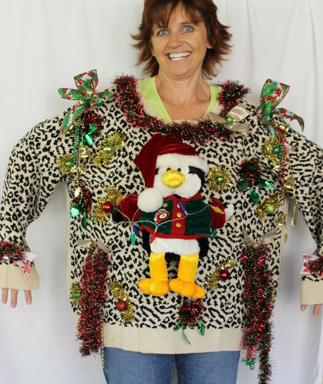 Ugly Christmas sweater with a crazy smile.