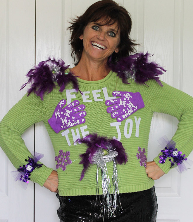 Ugly Christmas sweater with a crazy smile.