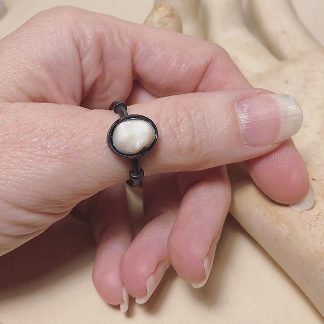 Human teeth jewelry.