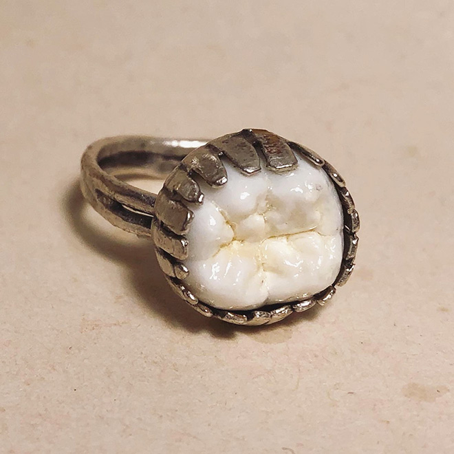 Human teeth jewelry.