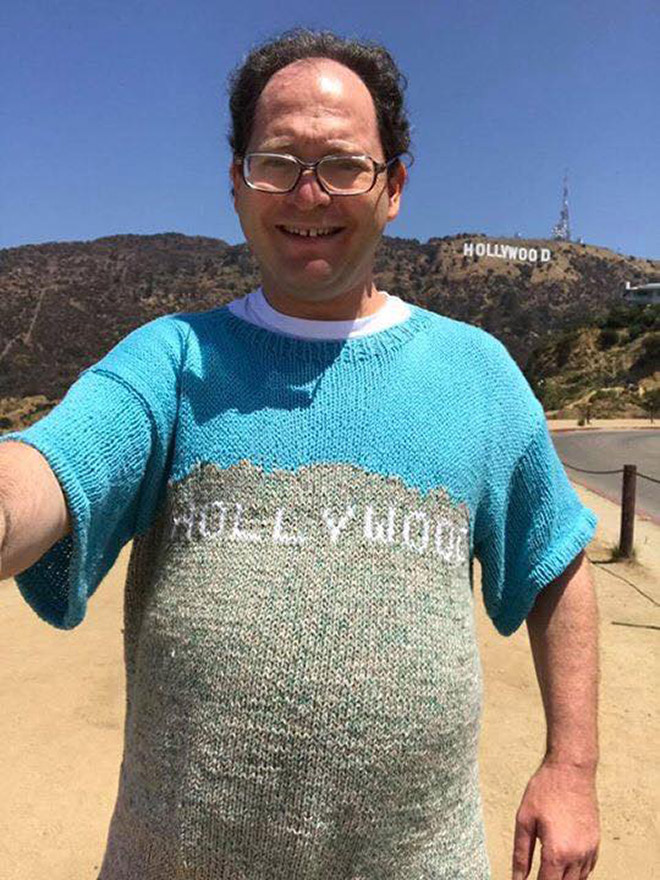 This guy wears matching sweater to the place he visits.