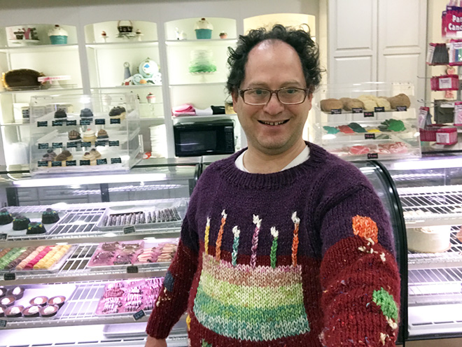 This guy wears matching sweater to the place he visits.