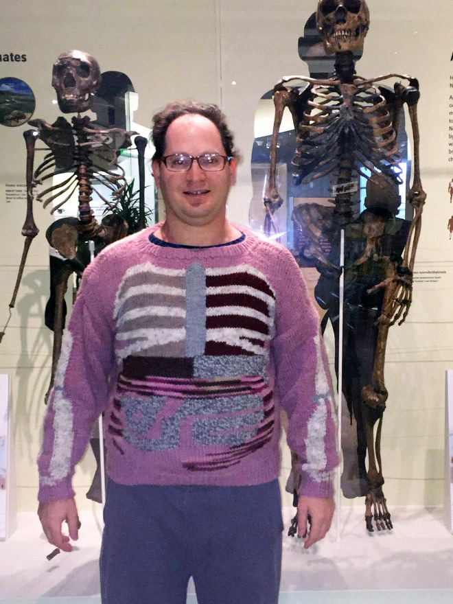 This guy wears matching sweater to the place he visits.