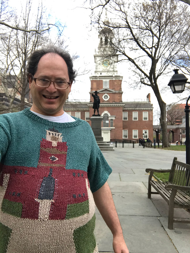 This guy wears matching sweater to the place he visits.