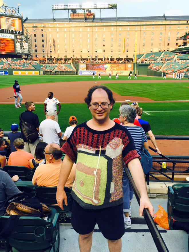 This guy wears matching sweater to the place he visits.