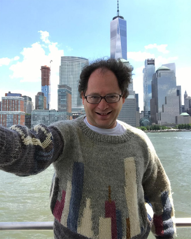 This guy wears matching sweater to the place he visits.