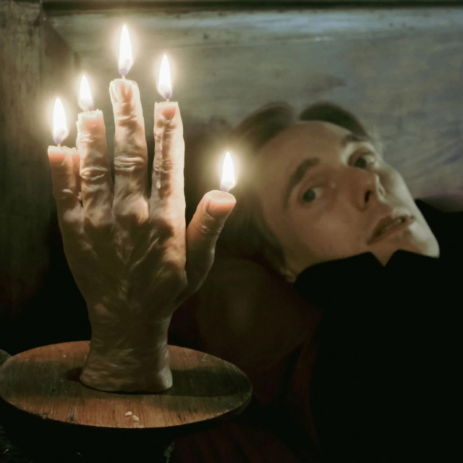 Ultra-realistic human hand candle.