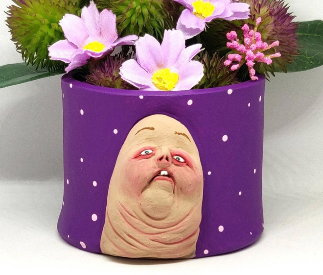Ugly, weird, creepy pot.
