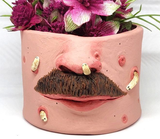 Ugly, weird, creepy pot.