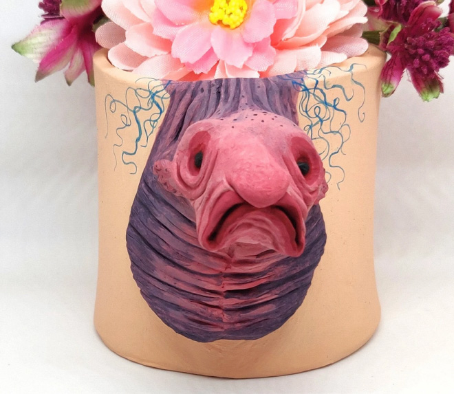 Ugly, weird, creepy pot.