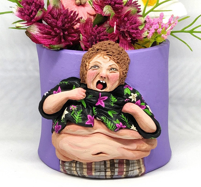 Ugly, weird, creepy pot.