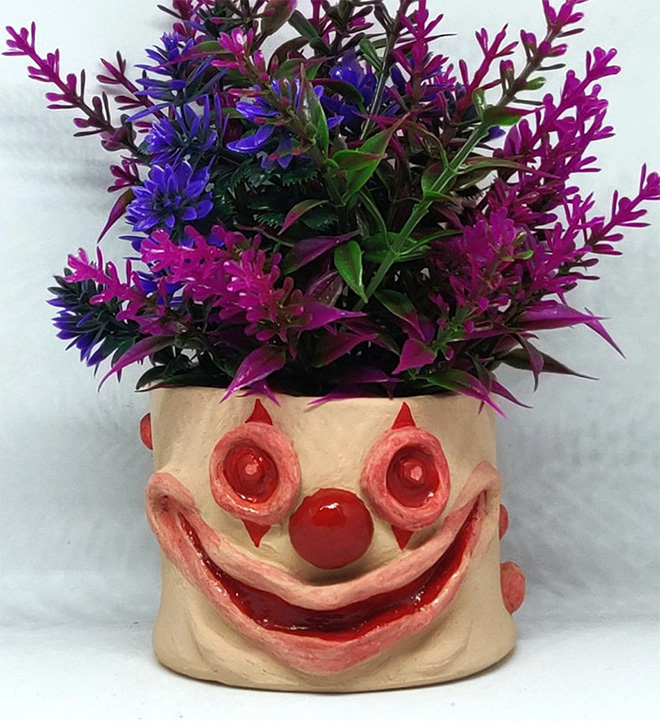 Ugly, weird, creepy pot.