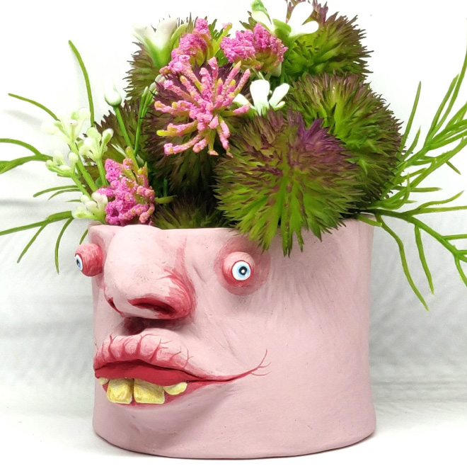 Ugly, weird, creepy pot.