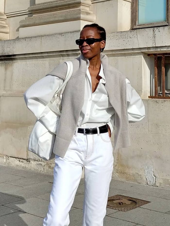 Model Wears White Jeans and a Brown Long-sleeved Shirt during the