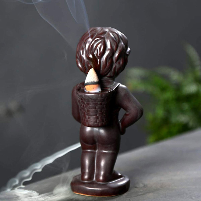 Pissing boy incense burner.