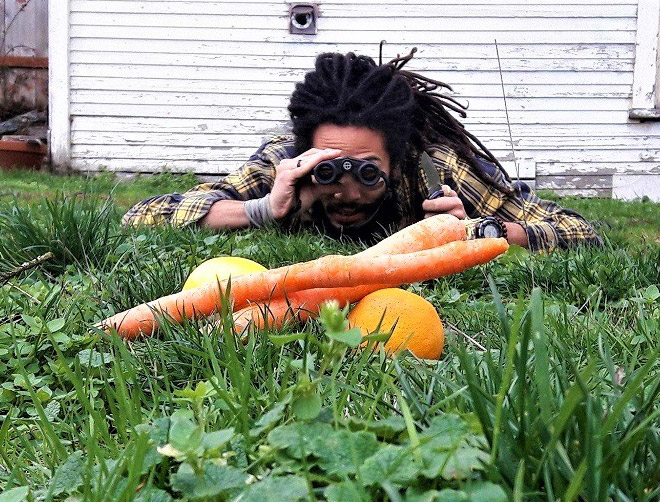 Vegan hunter posing with his trophies.