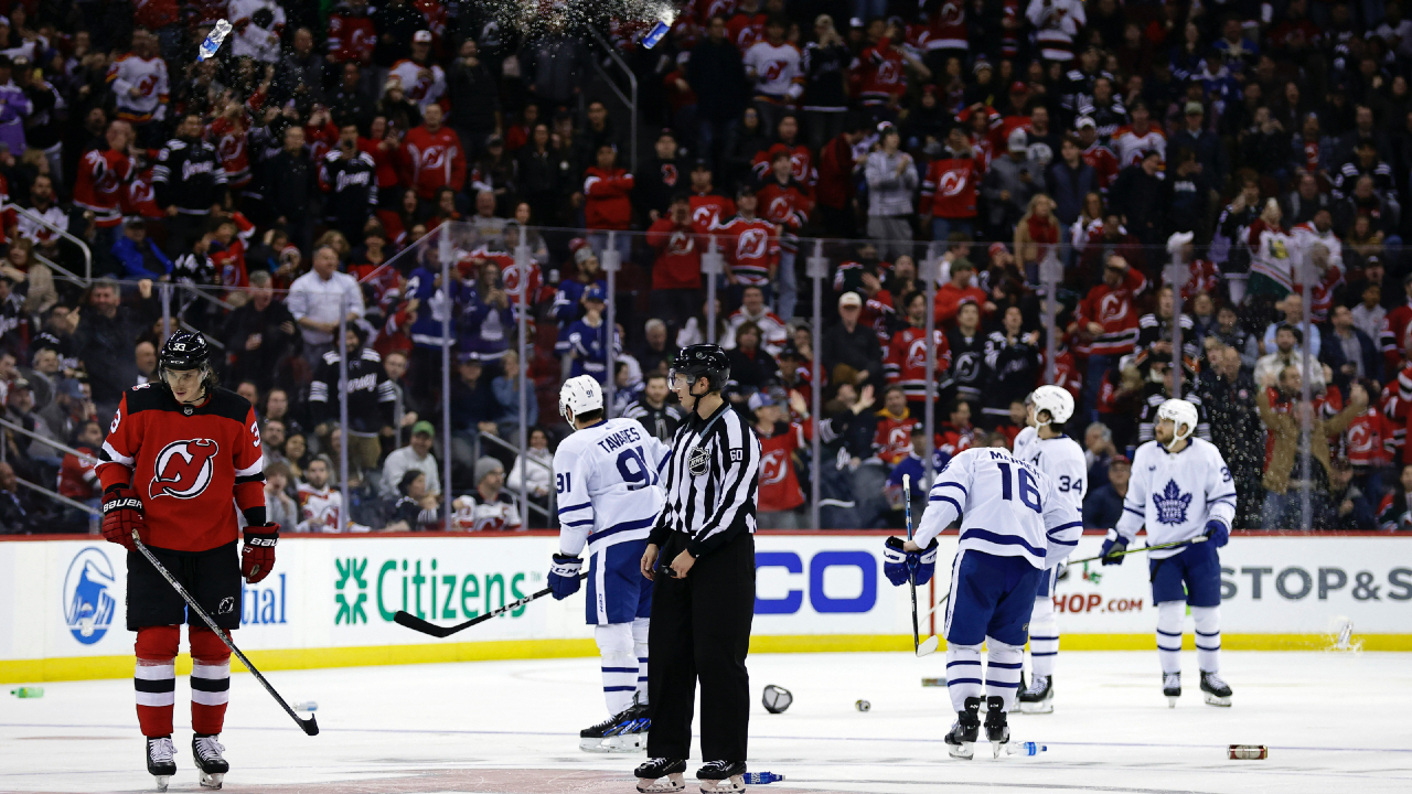 Maple Leafs dodge raining beer cans, late comeback to halt Devils’ win streak