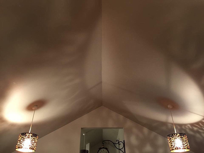 What do you see here? I see two lamp shadows.