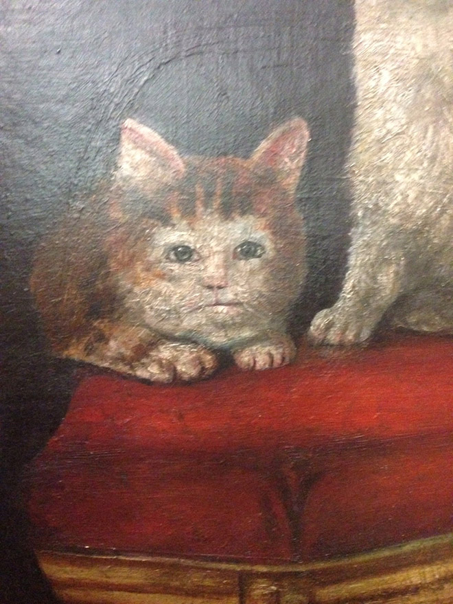 Ugly cat in medieval art.