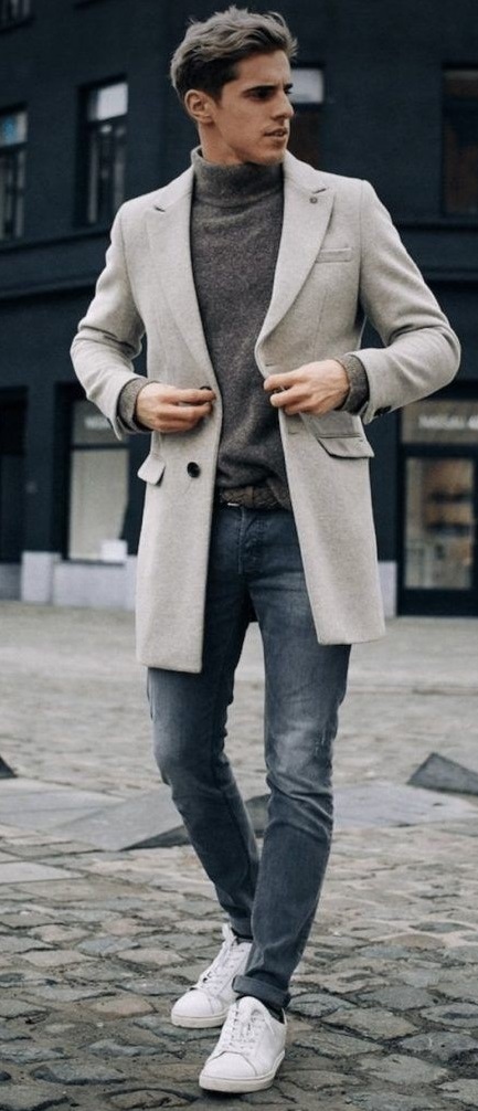 Grey turtle neck t-shirt with light grey colored overcoat. wearing a white sneaker and belt_