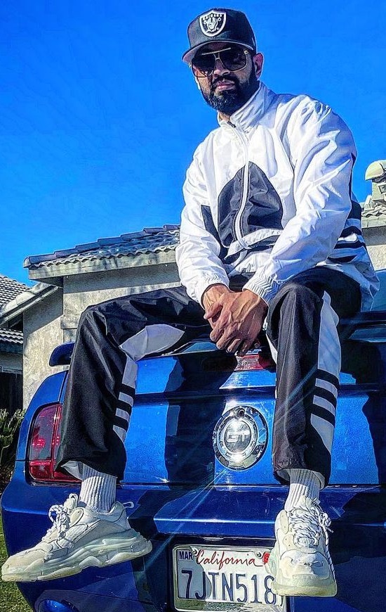 Balenciaga Triple S Sneakers with printed pants and a full-sleeved zipper, accessorized with shades, a cap and sneakers being one of the must-have products to own Balenciaga Triple S Sneakers with printed pants and a full-sleeved zipper, accessorized with shades, a cap and sneakers being one of the must-have products to own