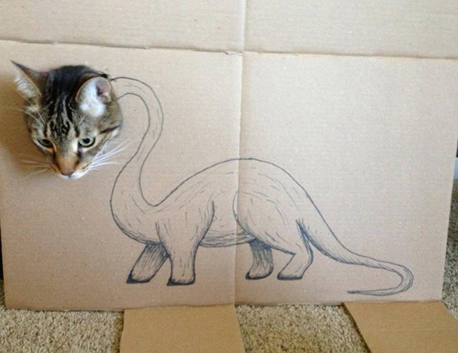 Cardboard dinosaur cat.